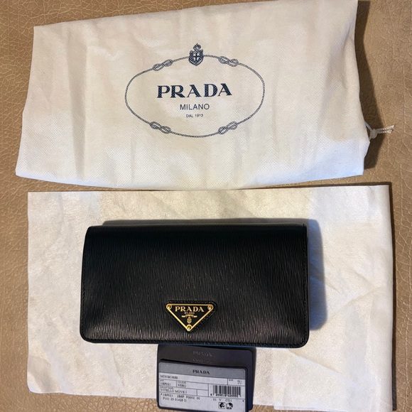Prada Handbags - Prada Black Saffiano Leather Mini Bag with Gold hardware